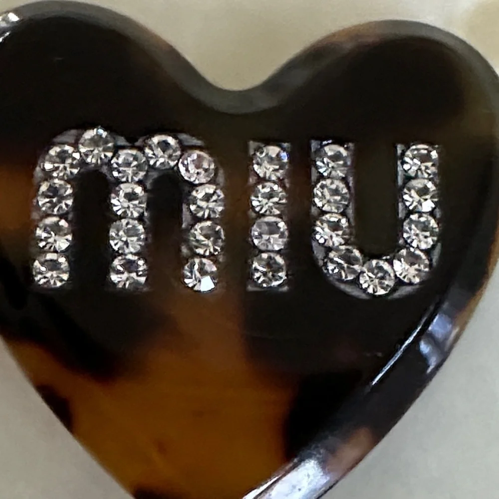 Miu Miu Tortoiseshell Heart Hair Clip with Gold Accents display picture 1